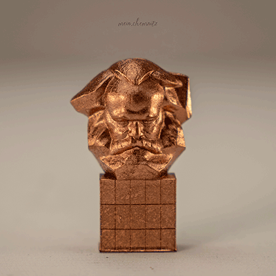 3D Magnet des Karl-Marx-Monuments in bronzefarbener Ausführung – detailreiche Miniatur als Chemnitz Souvenir.