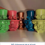 Mehrfarbige 3D-Magnete des Chemnitzer Karl-Marx-Kopfes mit Zylinderhut als limitierte Sonderedition zum Hutfest.